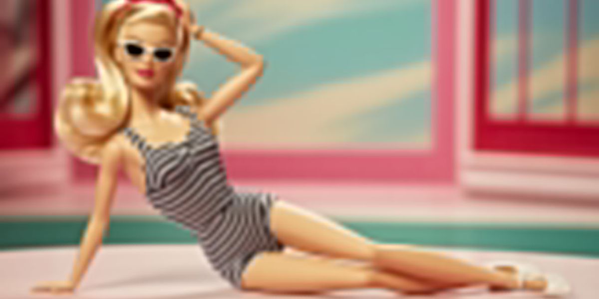 Barbie began her career as a fashion model—what was the very first outfit she debuted in